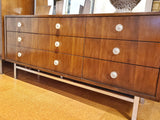 LOW WALNUT NINE-DRAWER DRESSER WITH LUCITE PULLS AND CHROME BASE