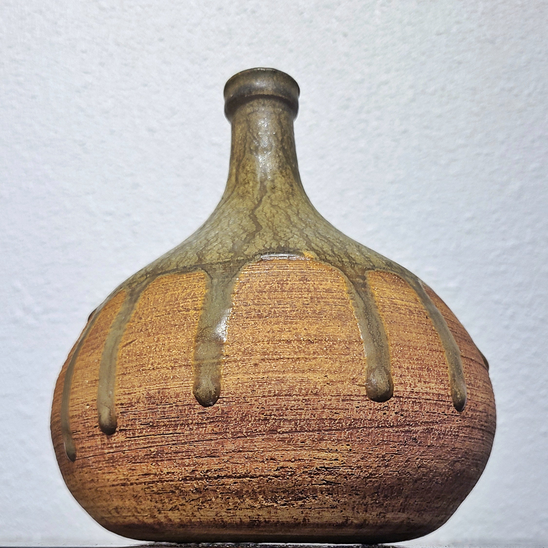 BULBOUS THIN NECKED STUDIO POTTERY VASE WITH GREEN DRIP