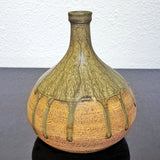 BULBOUS THIN NECKED STUDIO POTTERY VASE WITH GREEN DRIP