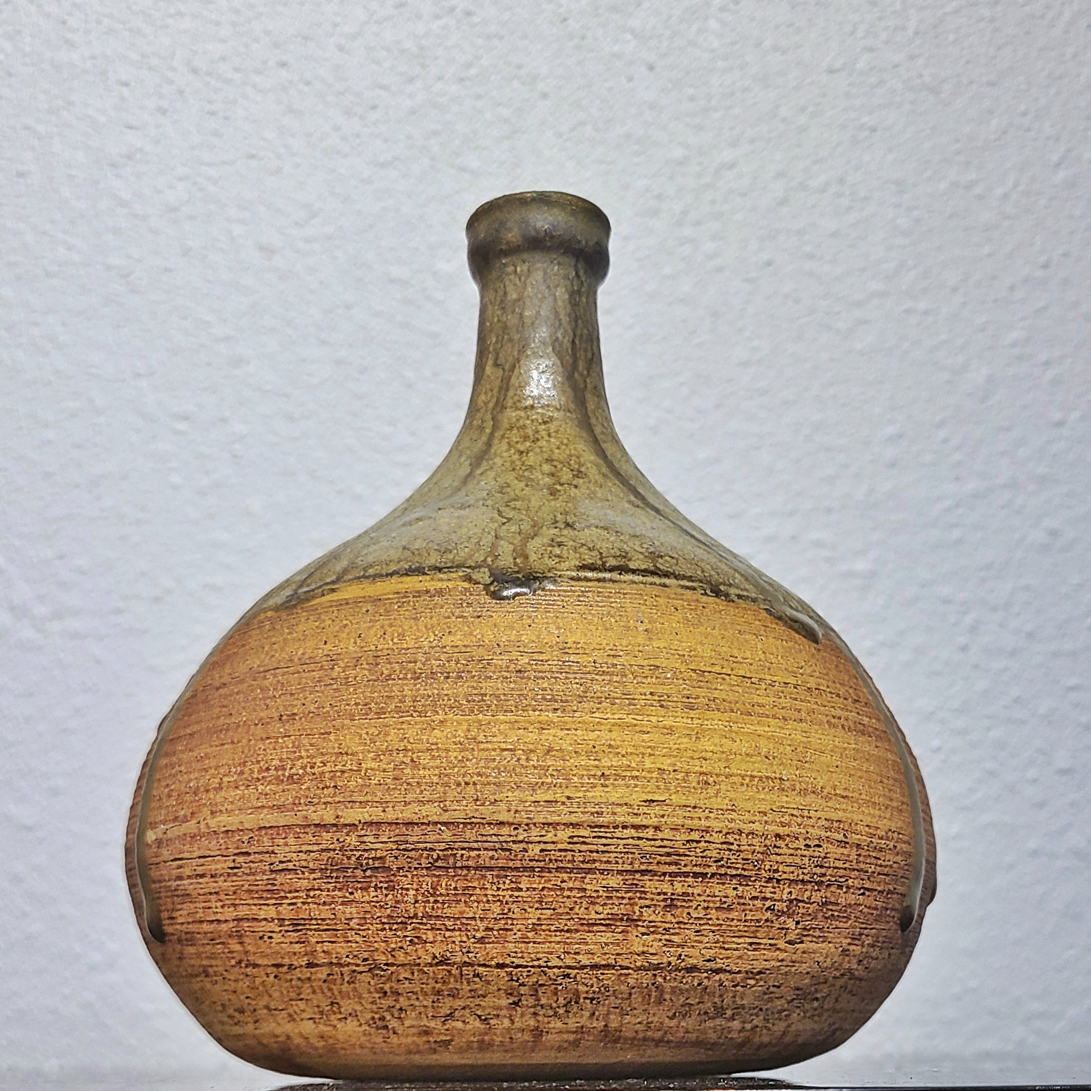 BULBOUS THIN NECKED STUDIO POTTERY VASE WITH GREEN DRIP