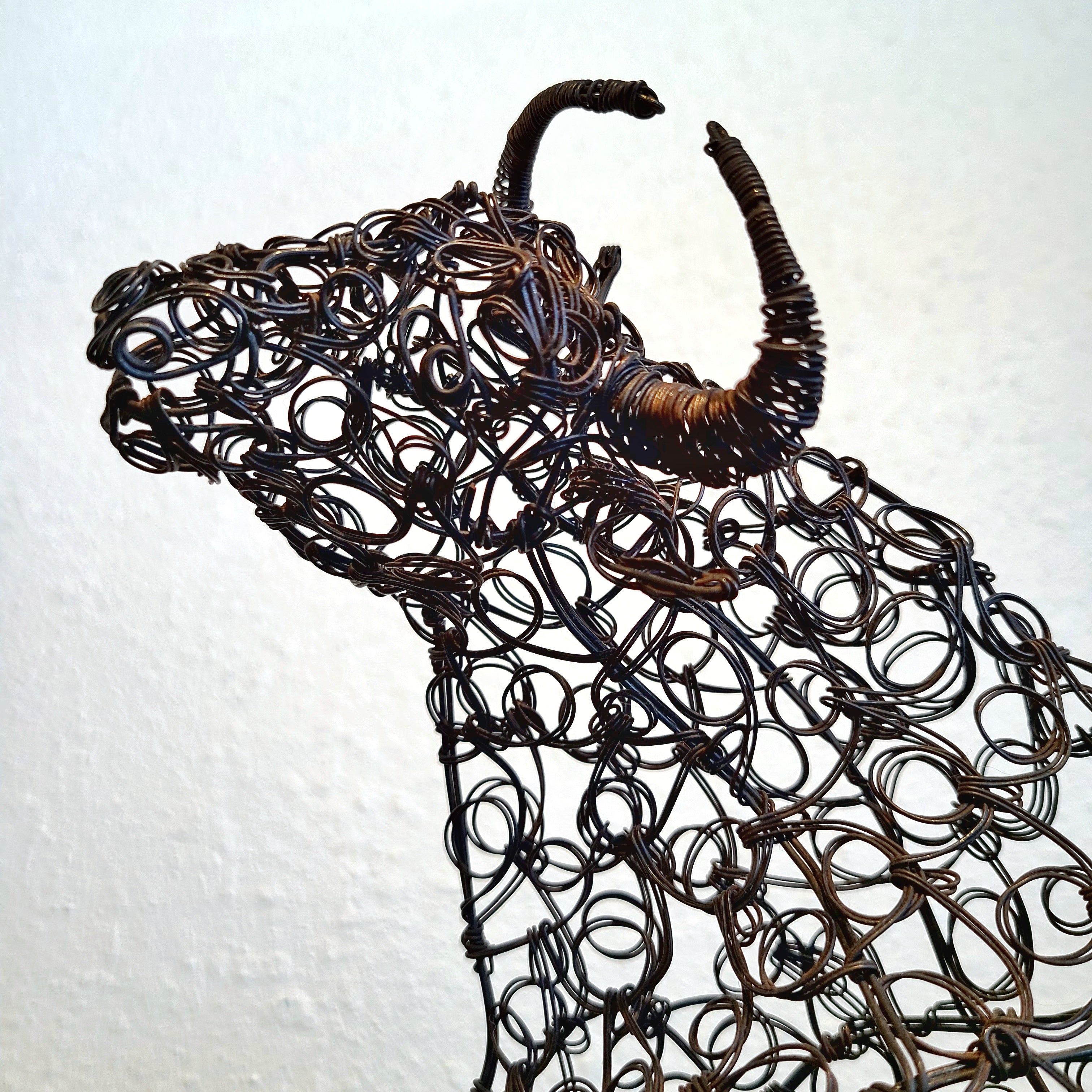 TWISTED WIRE SCULPTURE OF BANDERILLERO AND BULL