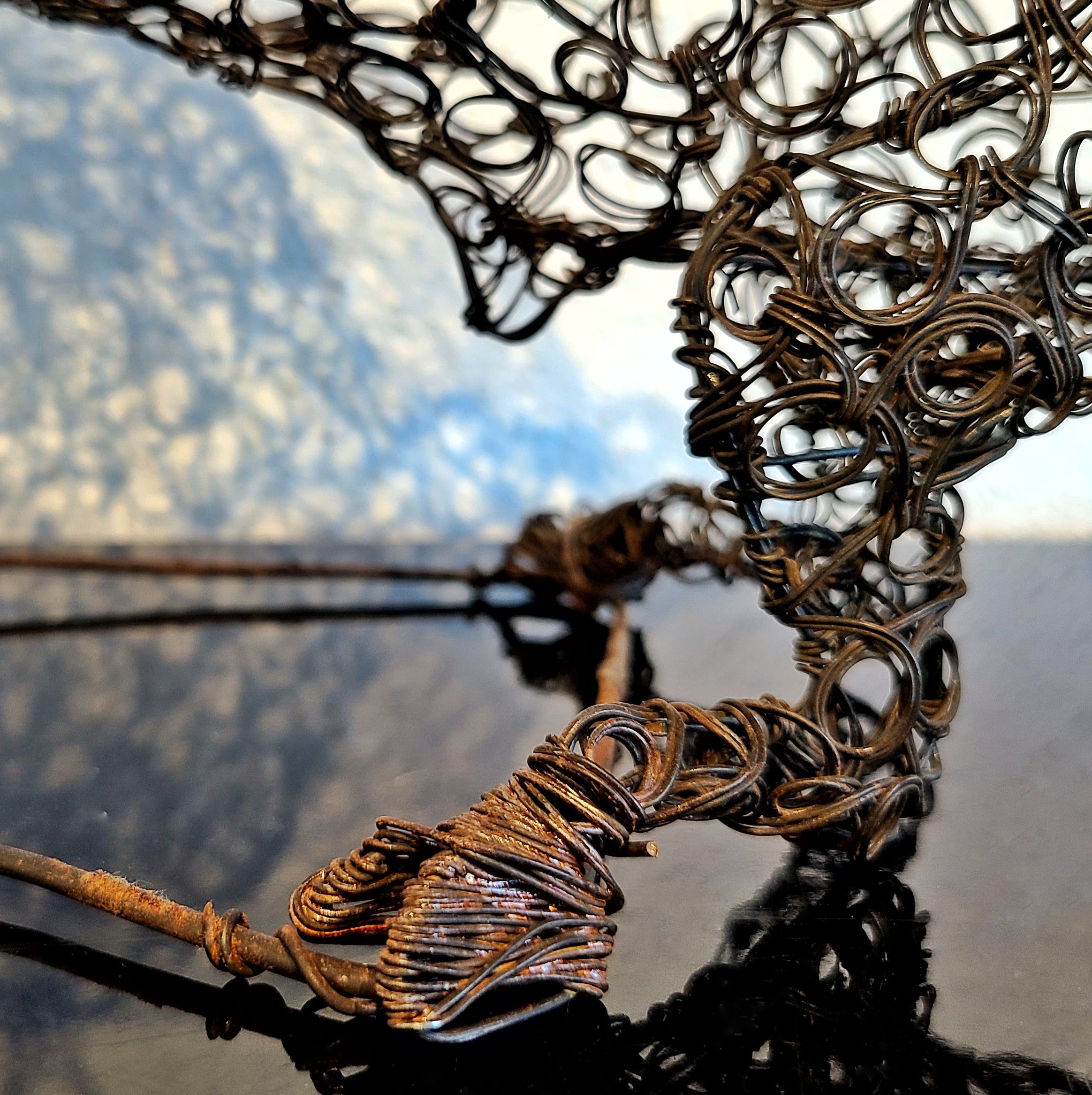 TWISTED WIRE SCULPTURE OF BANDERILLERO AND BULL