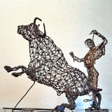 TWISTED WIRE SCULPTURE OF BANDERILLERO AND BULL