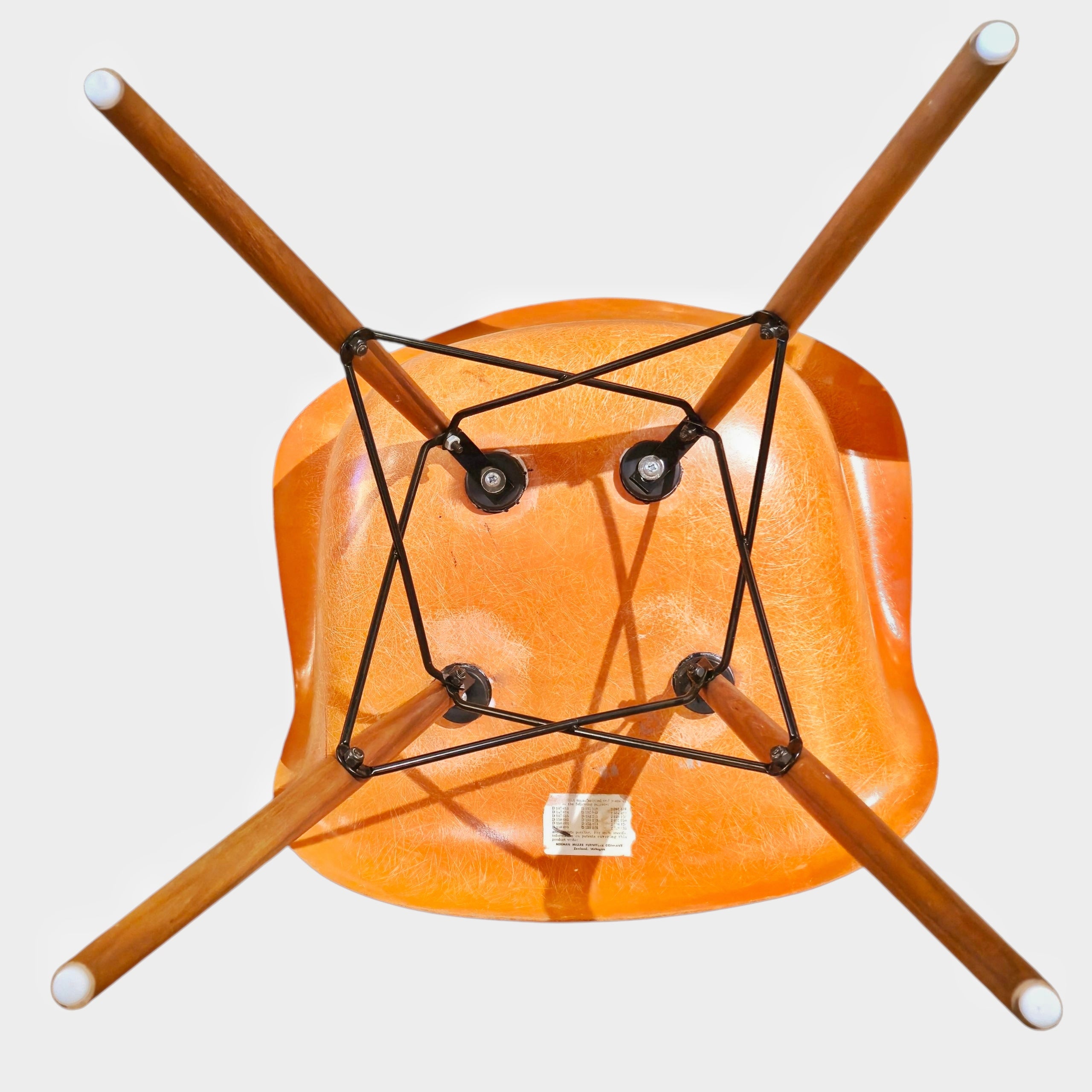 ORANGE EAMES MOLDED FIBERGLASS ‘DAW’ ARMCHAIR WITH NEW DOWEL BASE (2 AVAILABLE)
