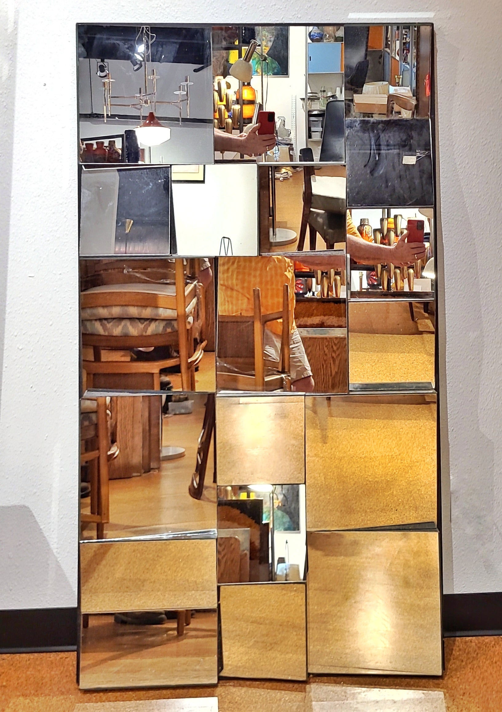 LARGE FACETED WALL MIRROR IN THE STYLE OF NEAL SMALL