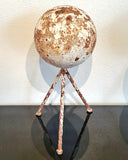 HEAVY IRON GARDEN SPHERE ON TWISTED IRON TRIPOD BASE (1940s)