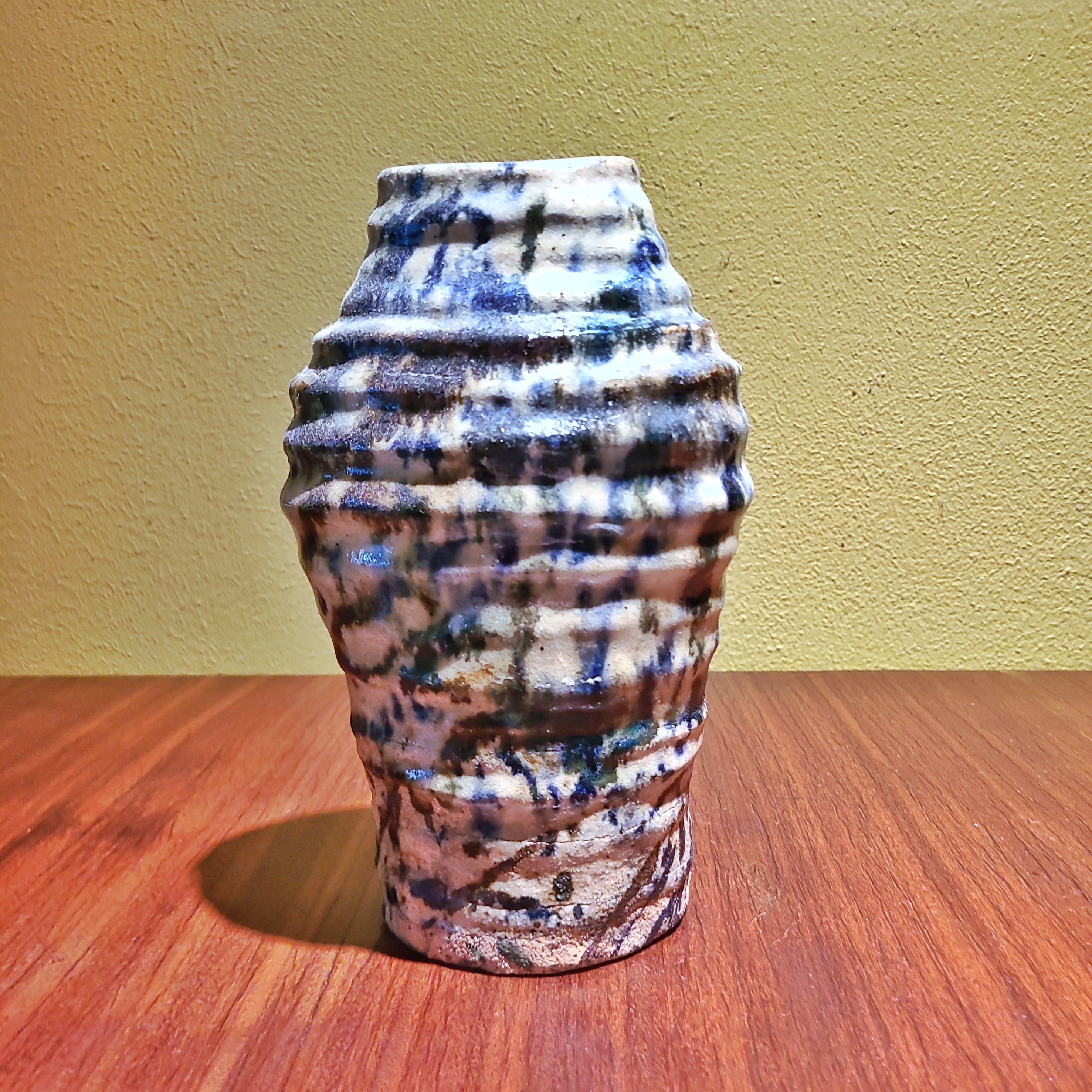 UNUSUAL COILED STONEWARE VASE SIGNED “RADOVICH”