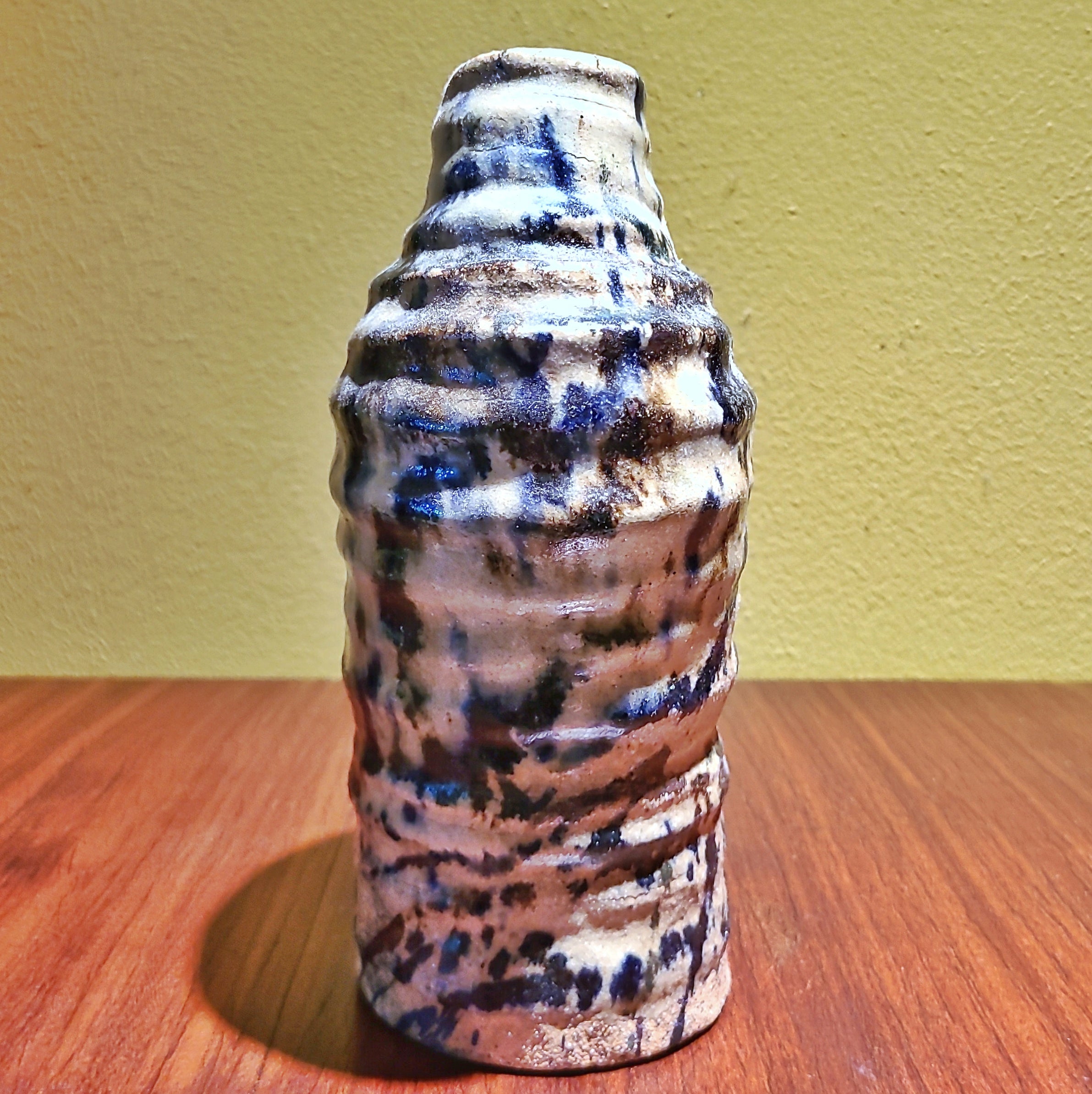 UNUSUAL COILED STONEWARE VASE SIGNED “RADOVICH”