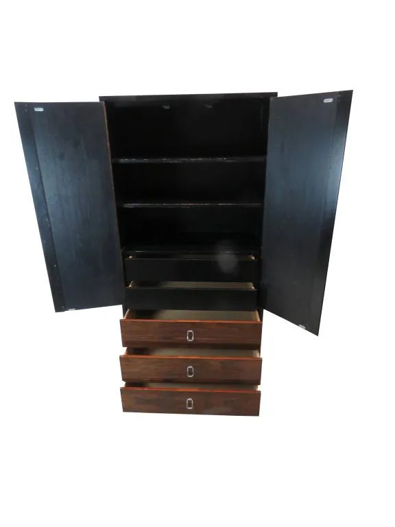 TALL MODERNIST EBONIZED KAS WITH ROSEWOOD DOOR AND DRAWER FRONTS