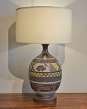 PAIR OF TABLE LAMPS WITH AFRICAN ANIMAL MOTIF