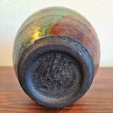 SIGNED IRIDESCENT RAKU-FIRED VASE (NOT WATERTIGHT)