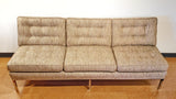 ARMLESS SOFA WITH CHROMED STEEL PLATFORM BASE