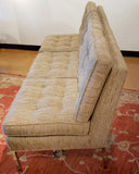 ARMLESS SOFA WITH CHROMED STEEL PLATFORM BASE